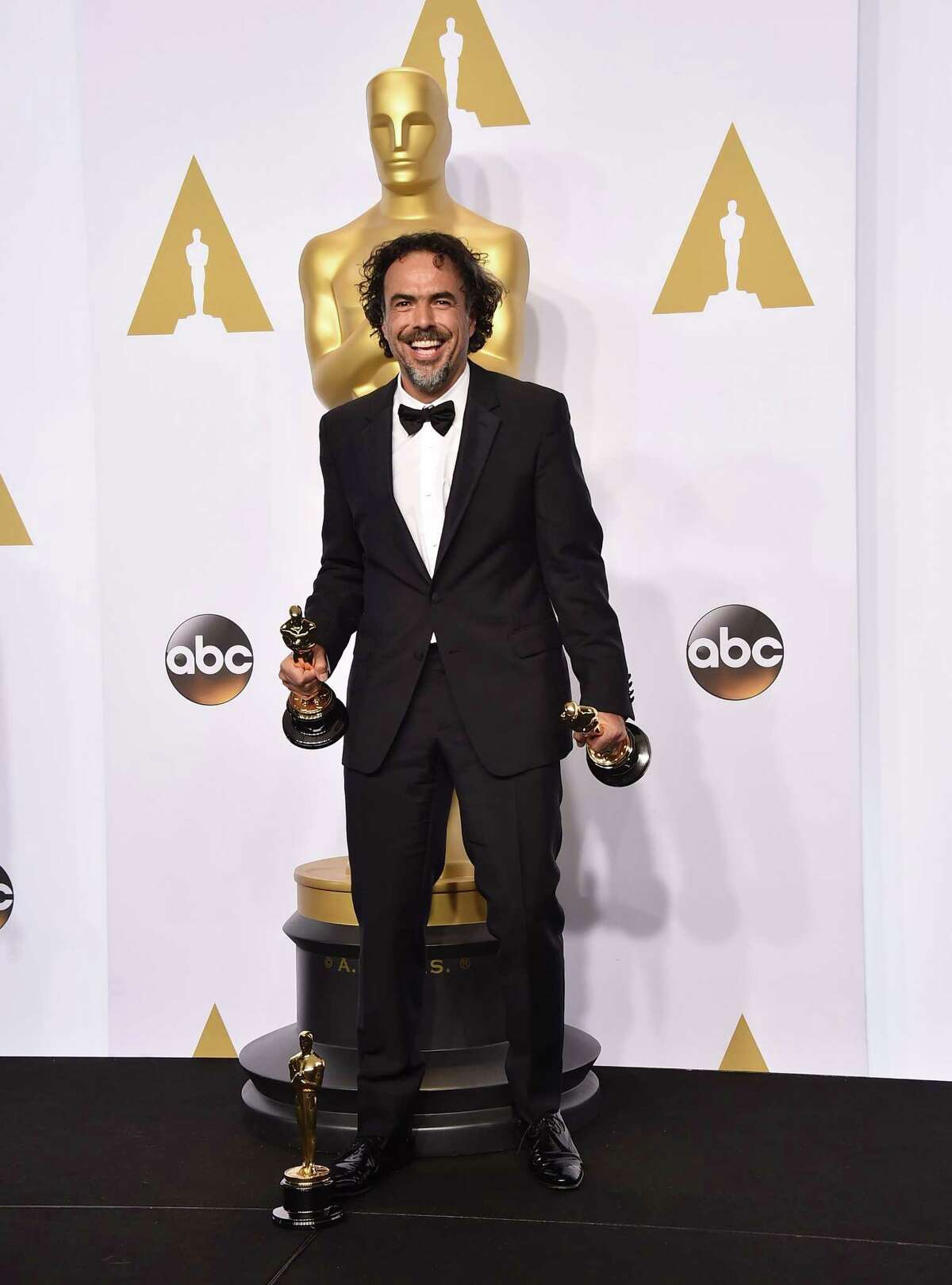 Alejandro Gonzalez Inarritu poses in the press room with the award for best picture for ìBirdman” at the Oscars on Sunday, Feb. 22, 2015, at the Dolby Theatre in Los Angeles.