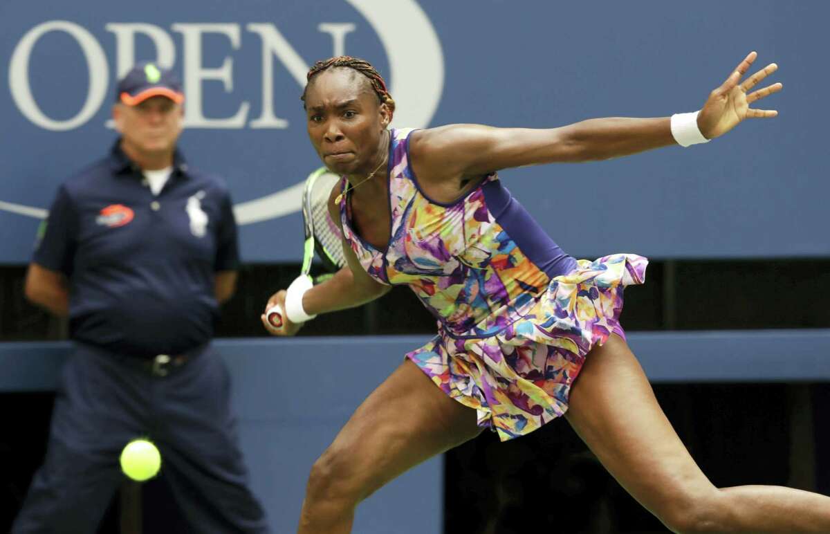 Venus Williams returns a shot to Karolina Pliskova during the fourth round of the U.S. Open Monday. Williams fell in a third-set tiebreaker.