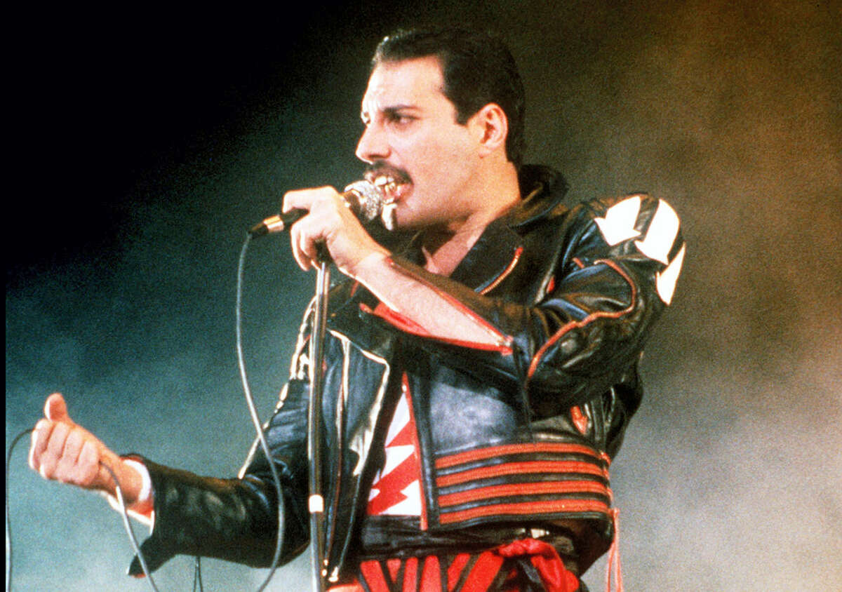 In this 1985 file photo, singer Freddie Mercury of the rock group Queen, performs at a concert in Sydney, Australia. Queen guitarist Brian May says an asteroid in Jupiter’s orbit has been named after the band’s late frontman Freddie Mercury on what would have been his 70th birthday, it was reported on Monday, Sept. 5, 2016. May says the International Astronomical Union’s Minor Planet Centre has designated an asteroid discovered in 1991, the year of Mercury’s death, as “Asteroid 17473 Freddiemercury.”