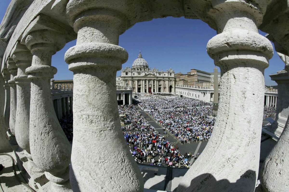 St. Peter’s Square is crowded with faithful attending a Canonization Mass by Pope Francis for Mother Teresa, at the Vatican, Sunday, Sept. 4, 2016. Francis has declared Mother Teresa a saint, honoring the tiny nun who cared for the world’s most destitute as an icon for a Catholic Church that goes to the peripheries to find poor, wounded souls. (AP Photo/Alessandra Tarantino)