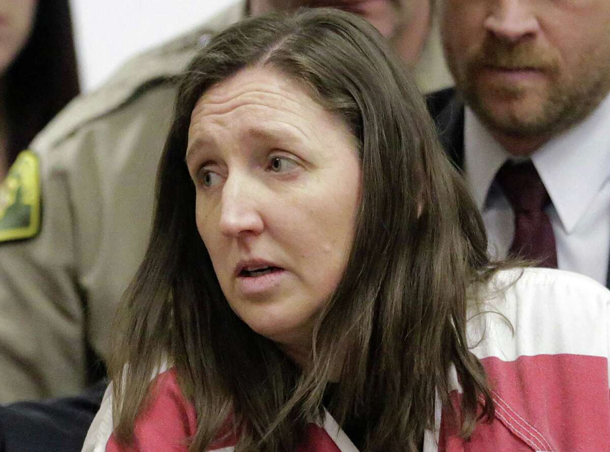 FILE - In this Feb. 12, 2015, file photo, Megan Huntsman arrives in court in Provo, Utah. Under intense questioning from detectives after the April 2014 discovery that Huntsman killed six of their babies and stored them in their garage in Pleasant Grove, Utah, Darren West repeatedly denied knowing of his wifeís shocking actions, according to transcripts of police interviews obtained through a public records request. (AP Photo/Rick Bowmer, Pool, File)
