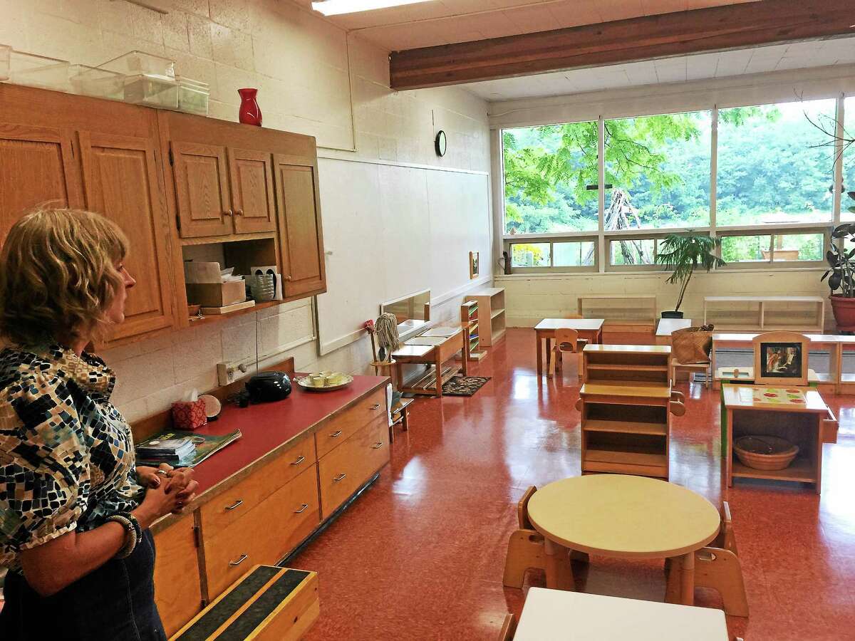 BEN LAMBERT — THE REGISTER CITIZEN Cara Roure Johnson shows a classroom at the Litchfield Montessori School.