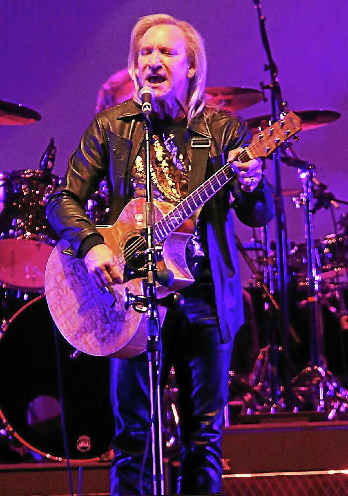 Photo by John Atashian Singer, songwriter and multi-instrumentalist Joe Walsh is shown performing to a full house of fans at the Mohegan Sun Arena in Uncasville Oct. 16. Joe played songs from his 40 year music career, which included material from The James Gang, The Eagles and his solo material.