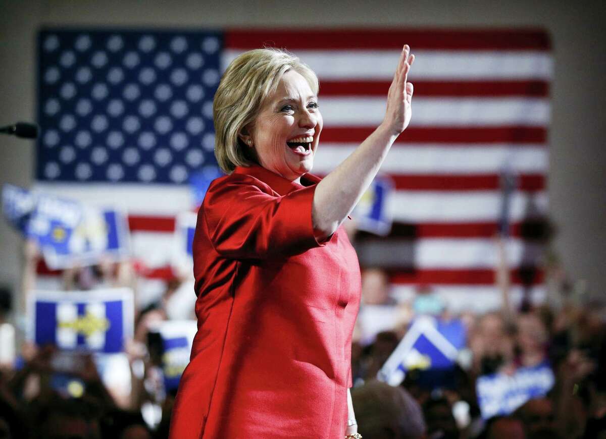 Democratic presidential candidate Hillary Clinton, waves at a Nevada Democratic caucus rally, Saturday, Feb. 20, 2016, in Las Vegas.