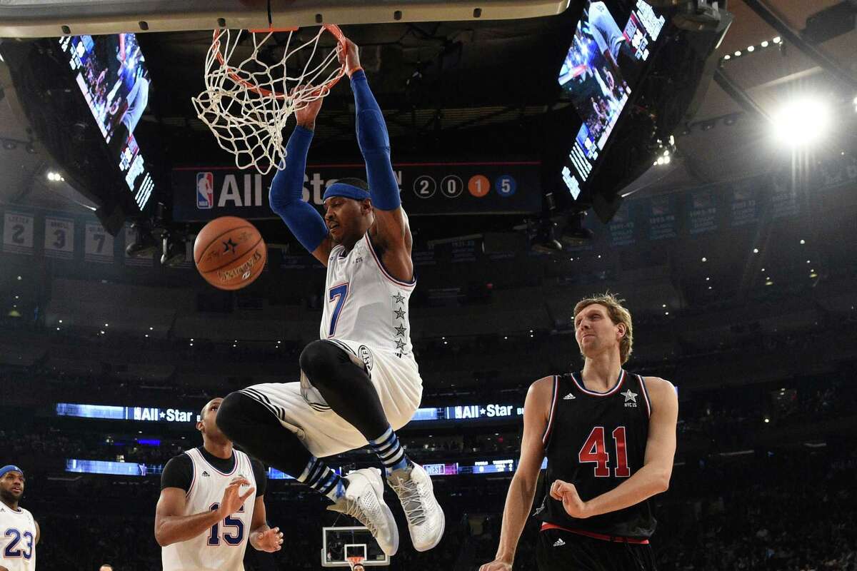 The East’s Carmelo Anthony scores a basket during the second half of the NBA All-Star Game on Sunday in New York.
