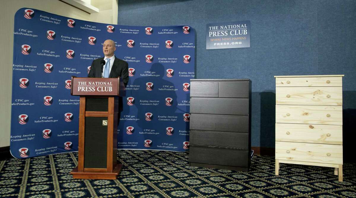 With two Ikea dressers displayed at right, Consumer Product Safety Commission (CPSC) Chairman Elliot Kaye speaks during a news conference at the National Press Club in Washington on June 28, 2016.