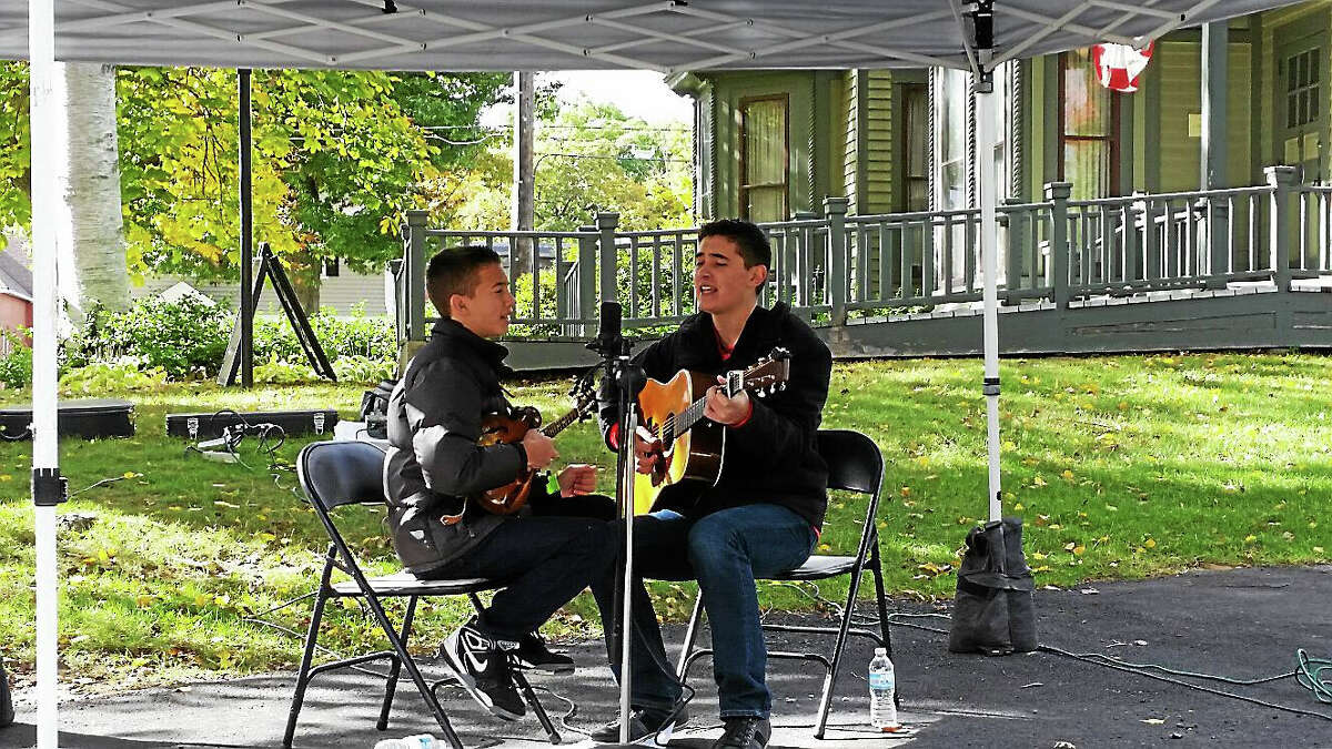 Brothers Sam (on mandolin) and Ben (on guitar) of The Zolla Boys, a local bluegrass band, performed classic songs during Torrington’s 275th anniversary celebration on Saturday from 12 to 5 p.m. along Main St. along the city’s downtown section.