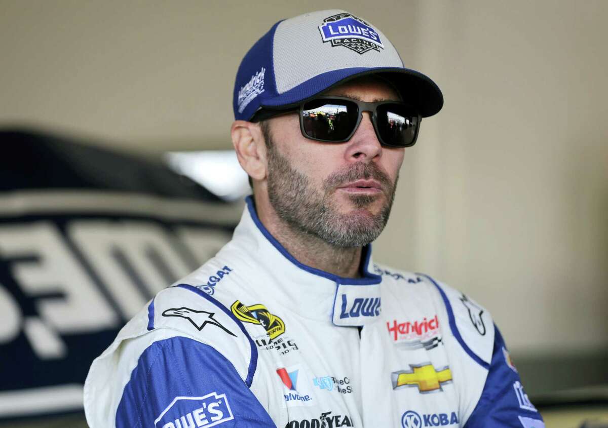 Jimmie Johnson looks from the garage area during practice for Sunday’s Daytona 500.