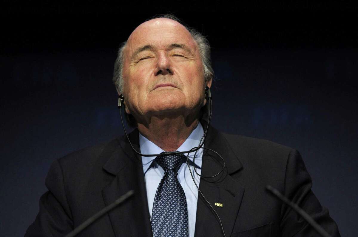 In this Nov. 19, 2010 file photo, FIFA President Sepp Blatter pauses during a press conference.