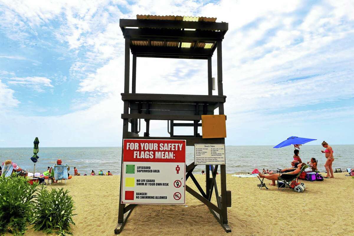 An empty lifeguard stand on East Beach at Hammonasset Beach State Park in Madison Monday.