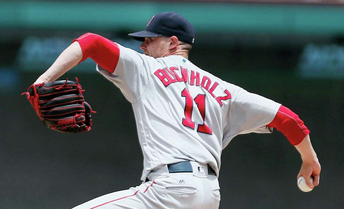 Red Sox starting pitcher Clay Buchholz throws during the first inning on Sunday.