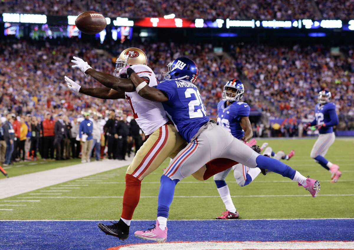 New York Giants cornerback Prince Amukamara (20) breaks up a pass intended for San Francisco 49ers wide receiver Anquan Boldin (81) on Sunday in East Rutherford, N.J.