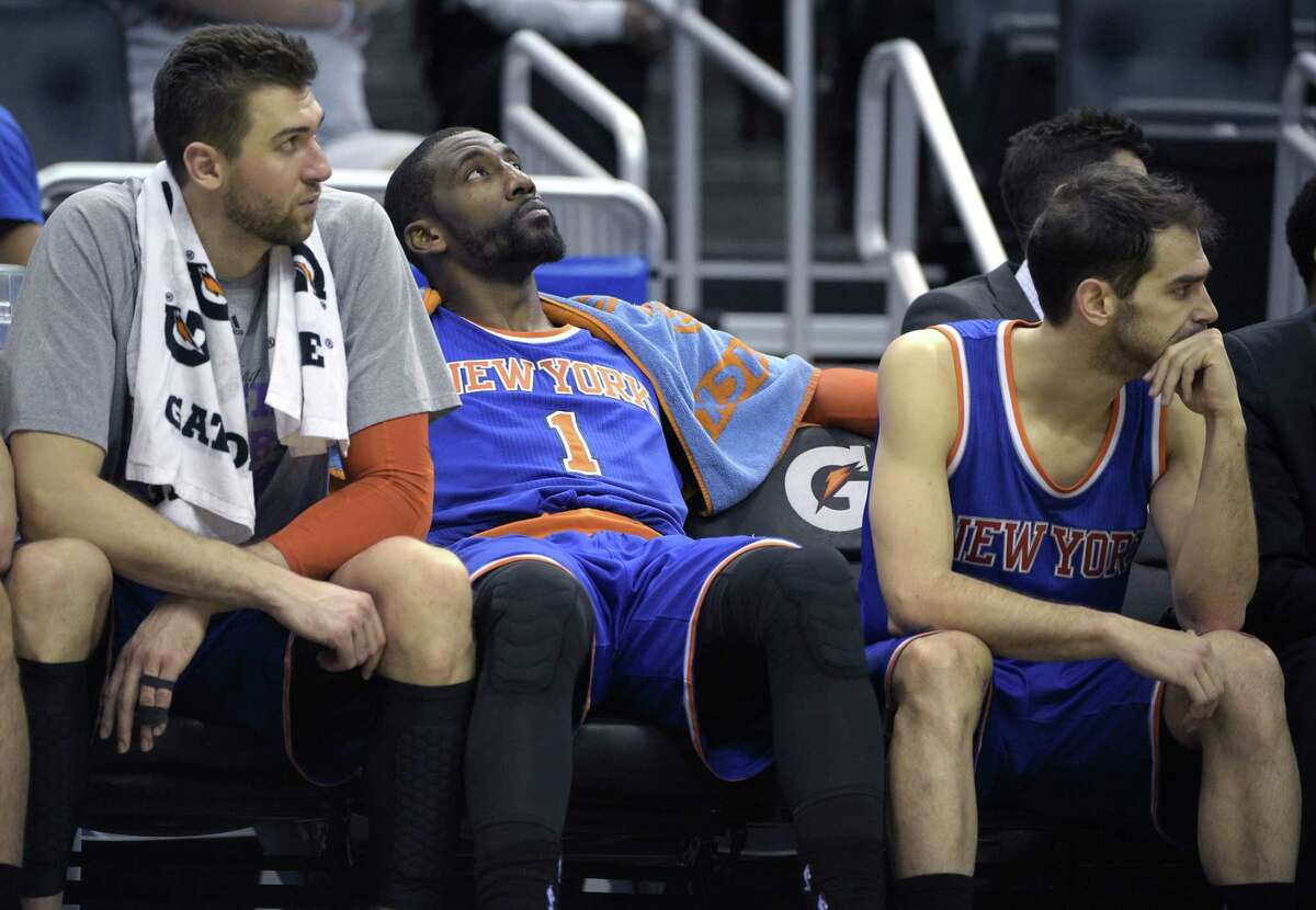 Amare Stoudemire, center, has agreed to a buyout from the Knicks.