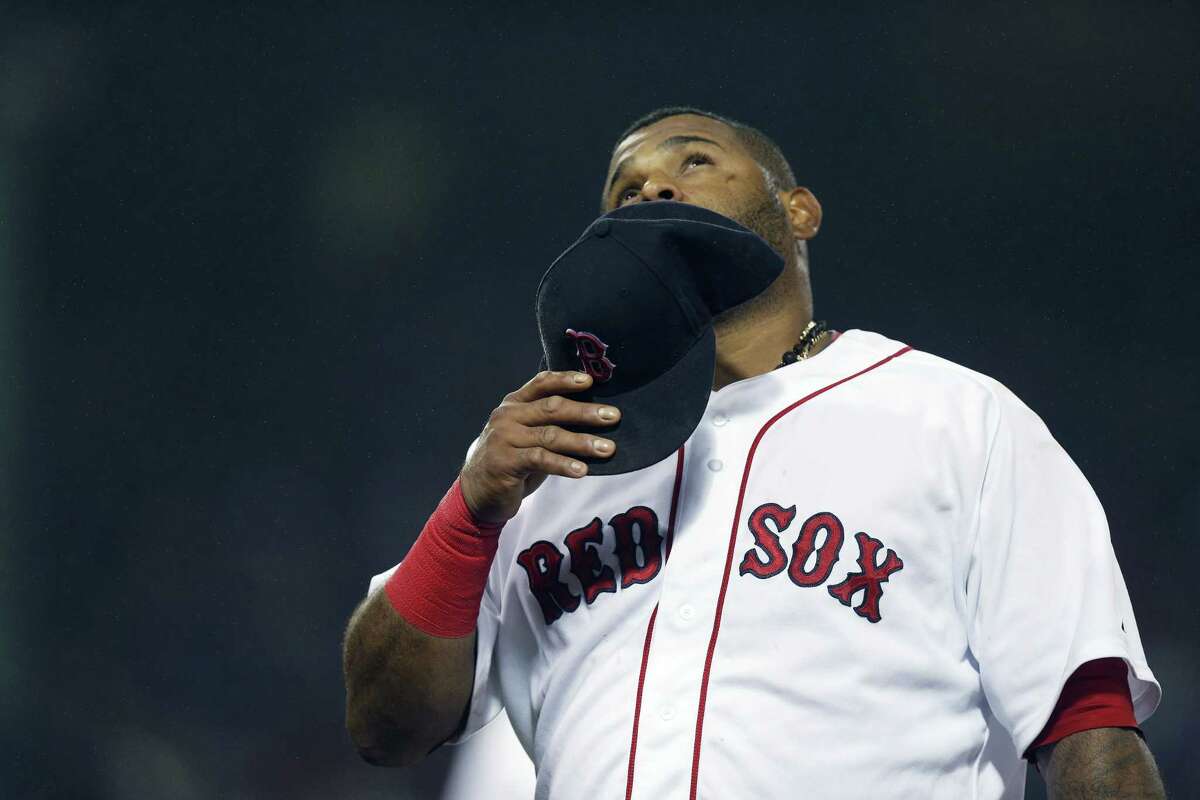 The Red Sox’s Pablo Sandoval looks up as he walks to the dugout during the ninth inning of Monday’s game against the Atlanta Braves in Boston.