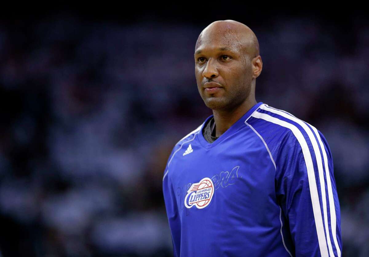 This Jan. 2, 2013 photo shows Los Angeles Clippers’ Lamar Odom (7) in action against the Golden State Warriors during an NBA basketball game in Oakland, Calif. Authorities say former NBA and reality TV star Odom has been hospitalized after he was found unconscious at a Nevada brothel.