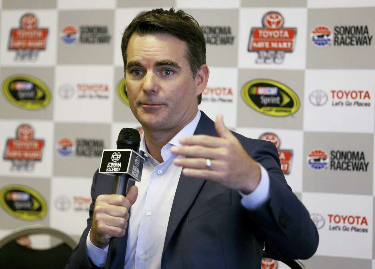Jeff Gordon gestures during a media conference prior to the qualifying session for the NASCAR Sprint Cup Series auto race on Saturday in Sonoma, Calif.