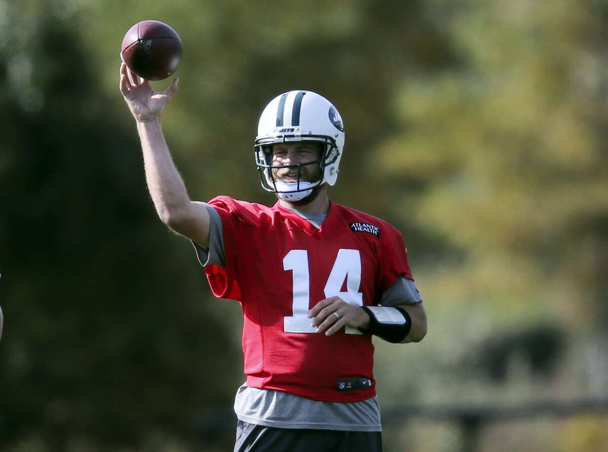 New York Jets quarterback Ryan Fitzpatrick throws during a NFL football practice in Florham Park, N.J.