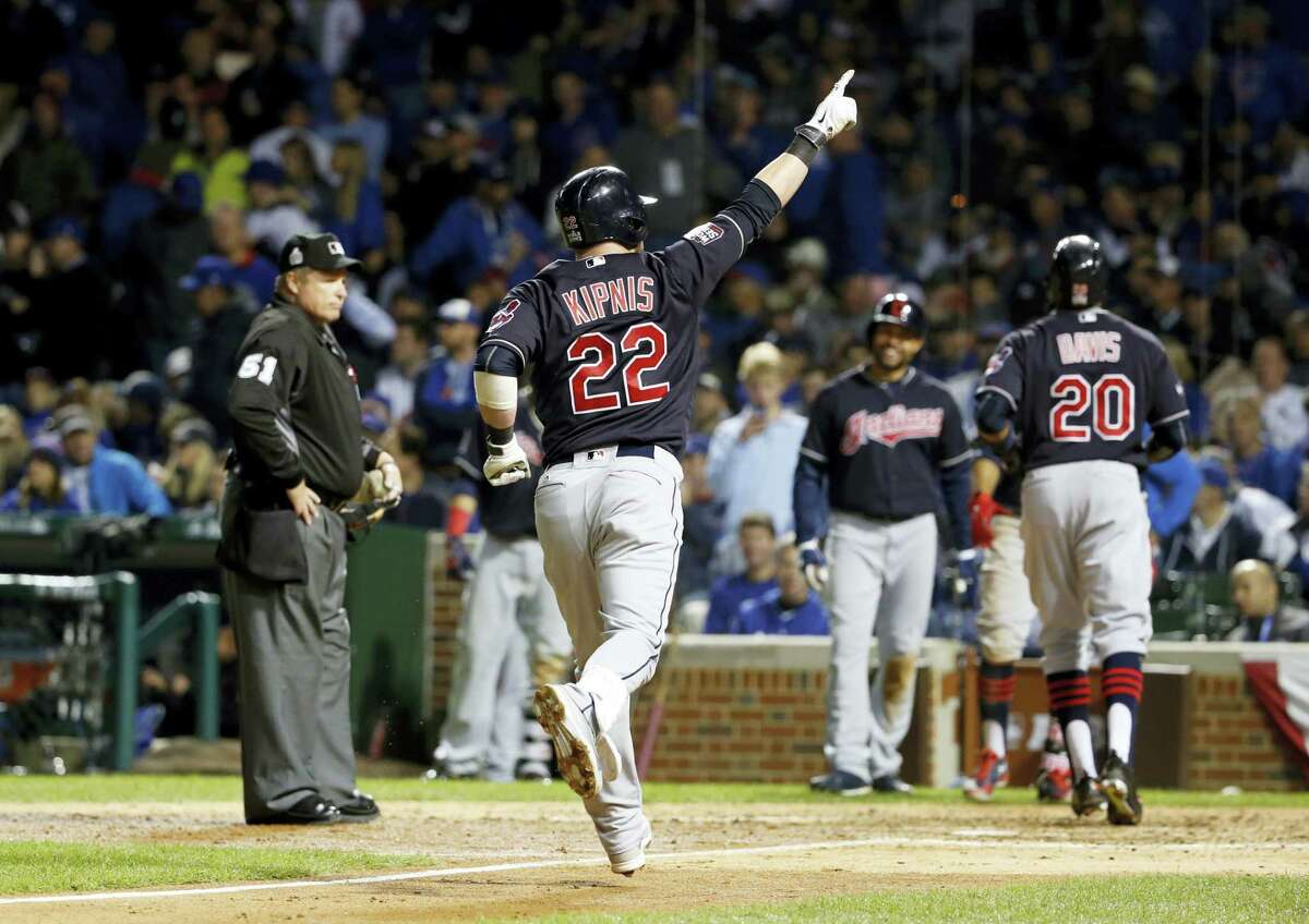The Indians’ Jason Kipnis (22) celebrates after hitting a three-run home run during the seventh inning of Game 4 of the World Series against the Cubs on Saturday in Chicago.