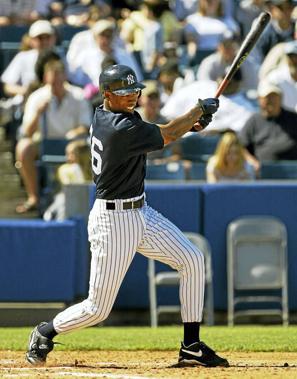 New York Yankees’ Doug Glanville swings through during one of his four at bats against the Philadelphia Phillies in 2005 at Legends Field in Tampa, Fla. Connecticut Gov. Dannel P. Malloy appointed Glanville to serve on the Connecticut commission responsible for enforcing professional standards for certifying police officers.
