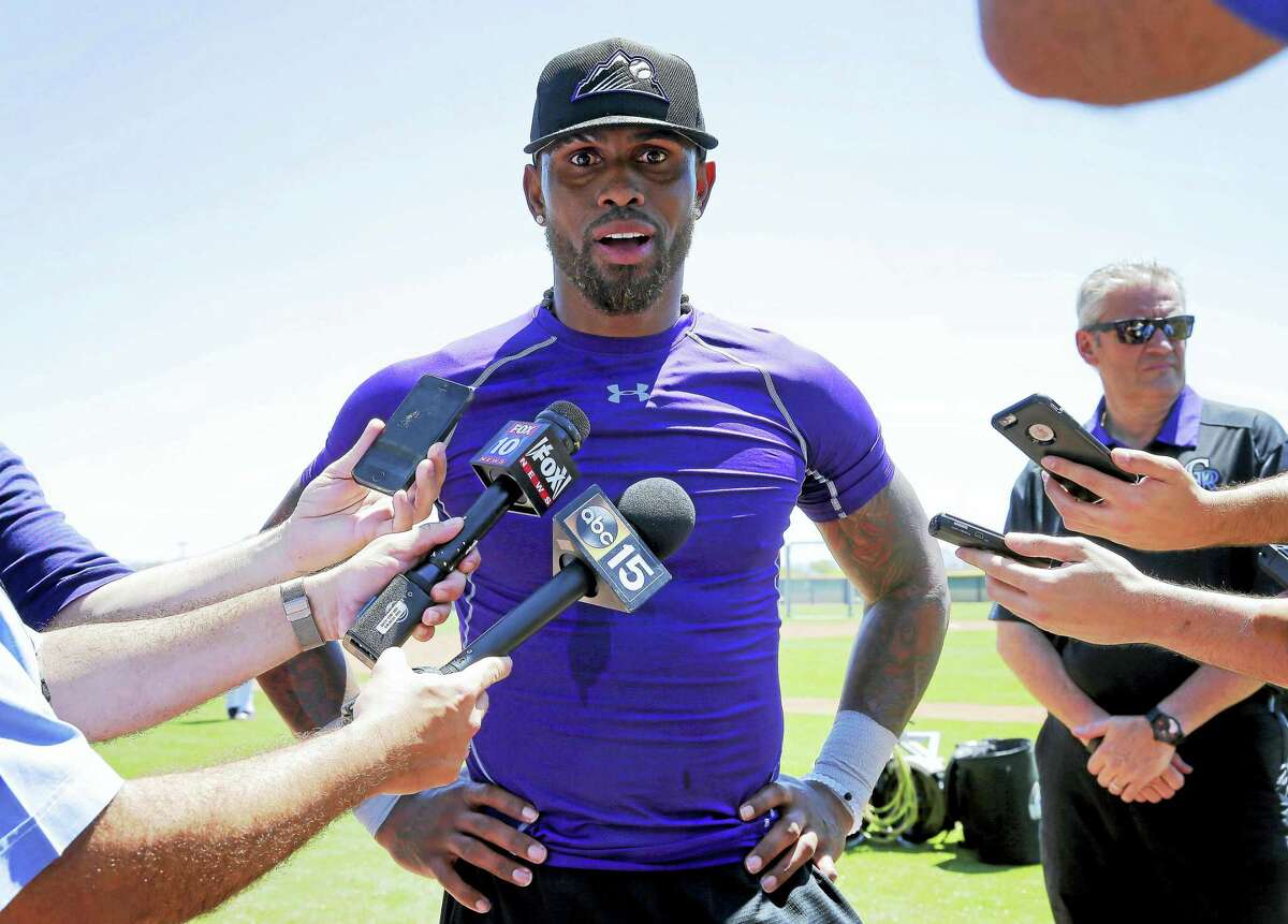Jose Reyes talks with reporters after an extended spring training workout in May.