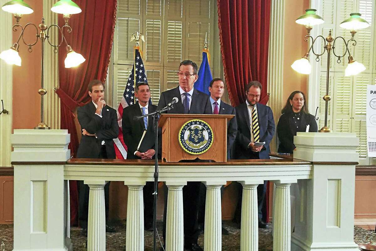 Gov. Dannel P. Malloy speaks during a press conference Tuesday introducing the Connecticut Family Stability Pay for Success project, which aims to assist families dealing with substance abuse. The event was held at the Old State House in Hartford.