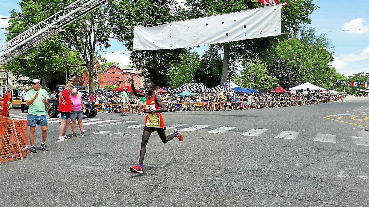 Moses Kiphosgei, 23, of Lansing, Michigan, came in second with a time of 34:20.