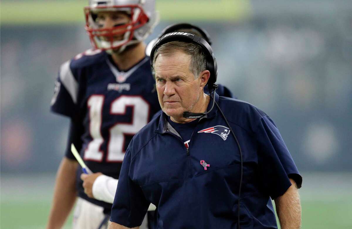 Patriots head coach Bill Belichick watches from the sidelines during the second half of the Patriots win over the Cowboys on Sunday.