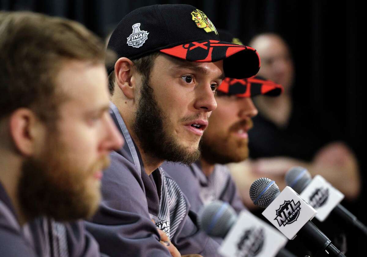 Blackhawks center Jonathan Toews talks during a news conference Sunday in Chicago.
