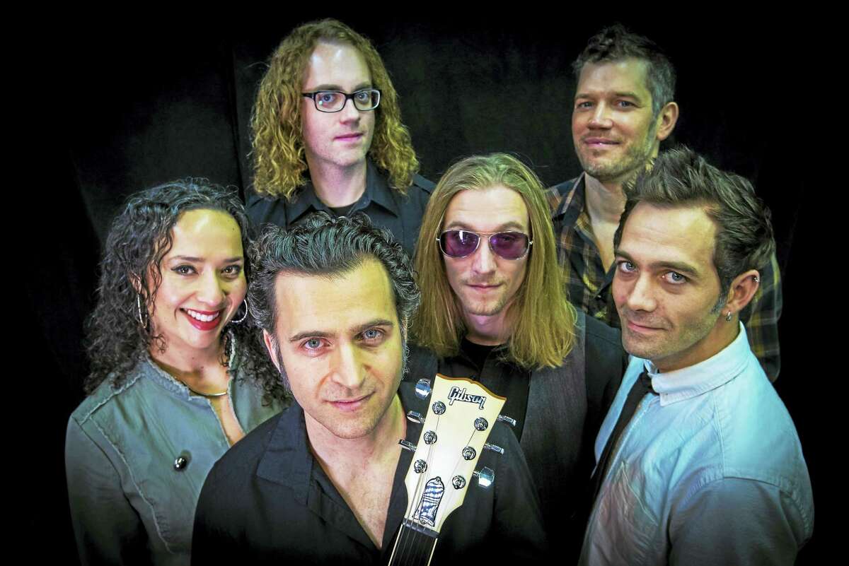 Dweezil Zappa, foreground, with his band.