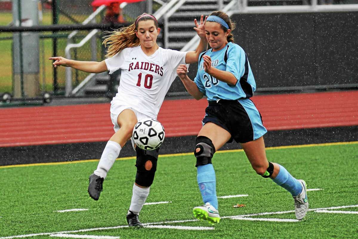 Marianne Killackey - Special to Register CitizenTorrington's Cassie Fedor controls the ball against Oxford’s Alexandra Adames Friday afternoon.