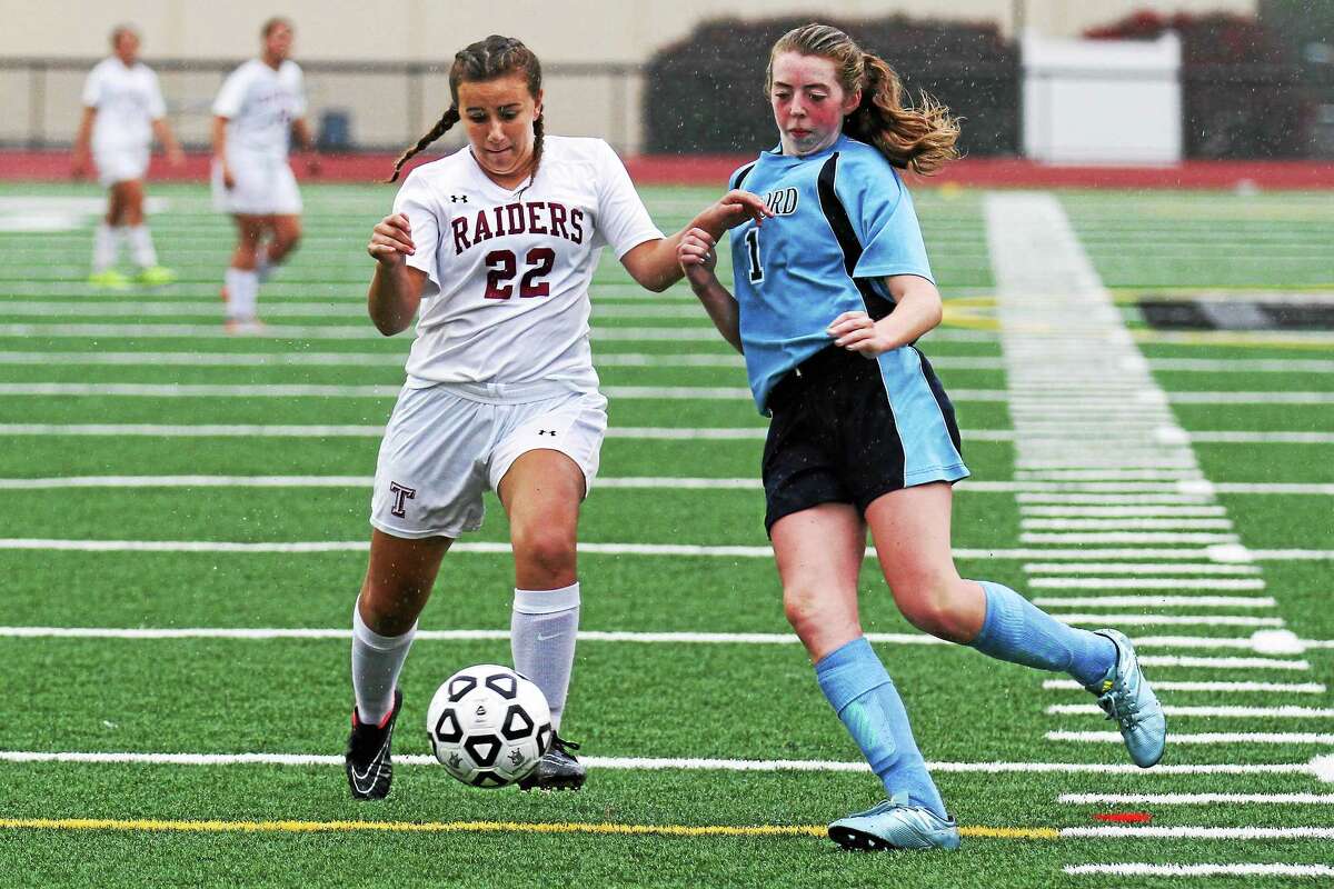 Marianne Killackey - Special to Register CitizenTorrington's Jessica Teti dribbles the ball against Oxford’s Maddie Smith Friday afternoon.