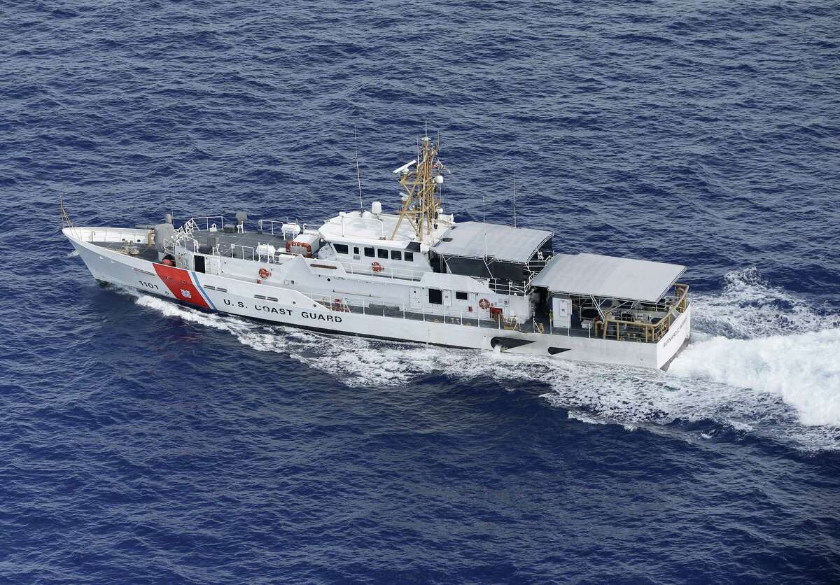 In this, Tuesday, May 19, 2015, photo, U.S. Coast Guard cutter Bernard C. Webber is shown off the coast of Fort Lauderdale, Fla. Despite a historic shift in the relationship between the governments on either side of the Florida Straits, the U.S. Coast Guard still plays a deadly hide-and-seek with Cuban migrants on the high seas, returning to the communist island anyone they catch. (AP Photo/Wilfredo Lee)