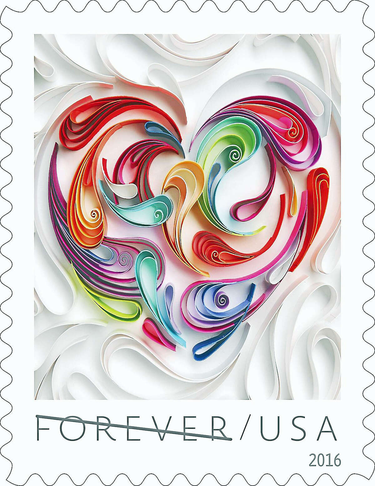 The 2016 Love stamp — a Quilled Paper Heart Forever stamp. The line through “Forever” is no reflection on the love theme, said a postal spokesman; it’s to prevent counterfeiting in this display only.