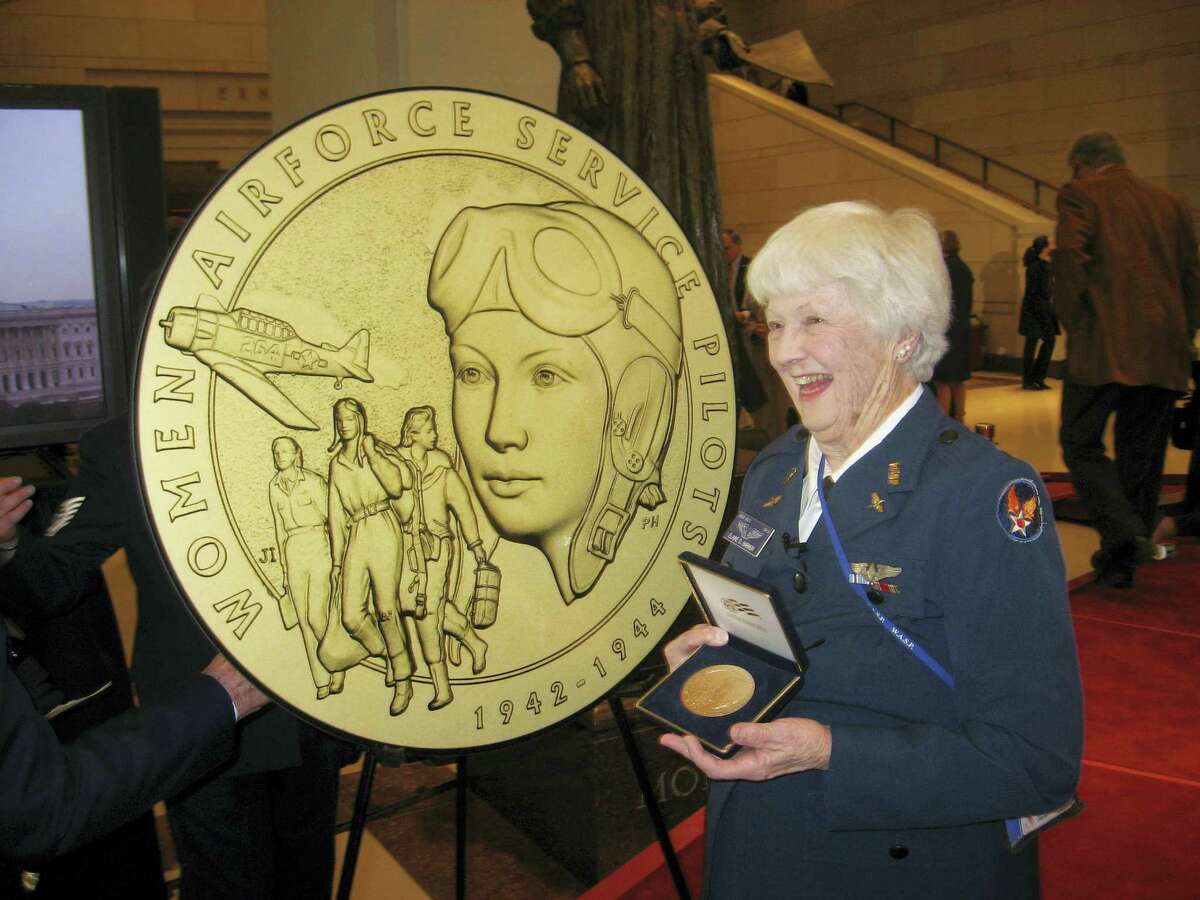 This photo provided by the Harmon family shows Elaine Harmon at the Congressional Gold Medal ceremony on Capitol Hill in Washington in 2010. The ashes of World War II veteran Harmon are sitting in a closet in her daughter’s home, where they will remain until they can go where her family says is her rightful resting place: Arlington National Cemetery. Harmon was a pilot in World War II under a special program, Women Airforce Service Pilots, that flew noncombat missions to free up male pilots for combat.