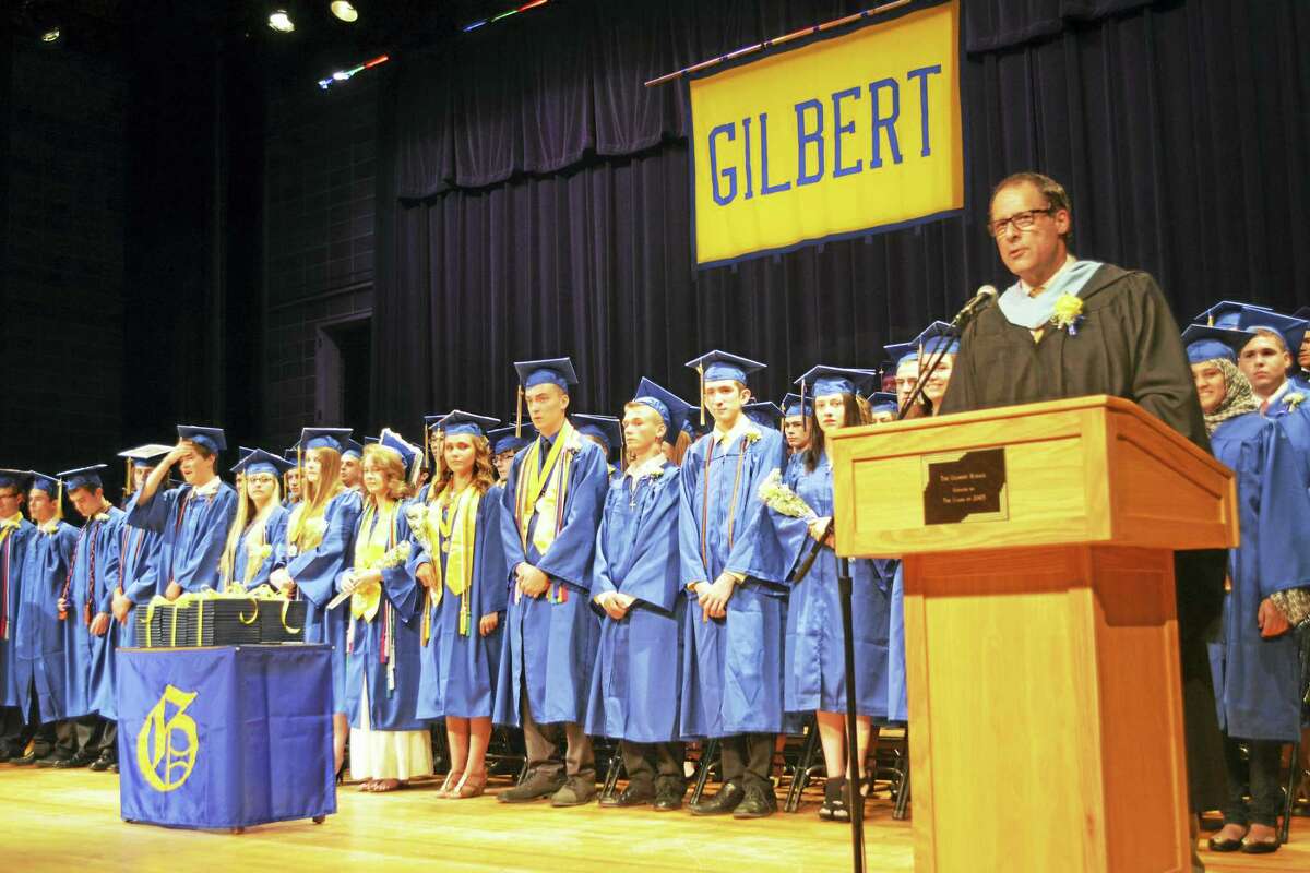 BEN LAMBERT — THE REGISTER CITIZEN Gilbert School Principal Alan Strauss speaking at the school’s 2015 graduation ceremony.