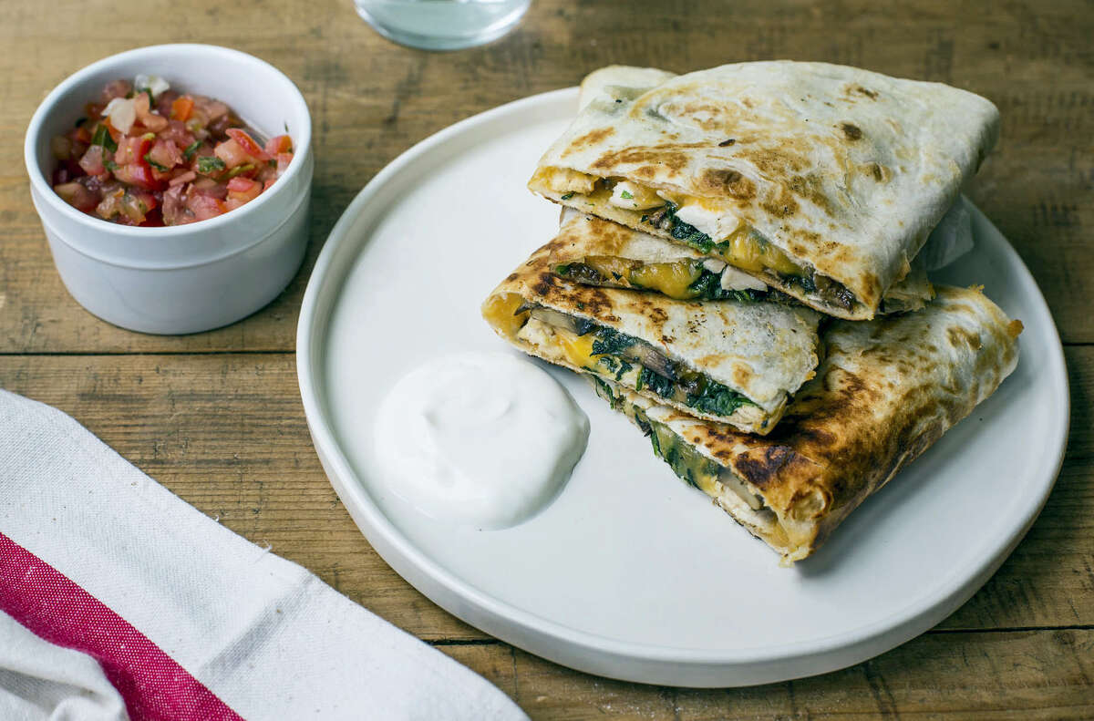 Spinach, mushroom and chicken quesadillas are a great idea for the pre-trick-or-treat rush.