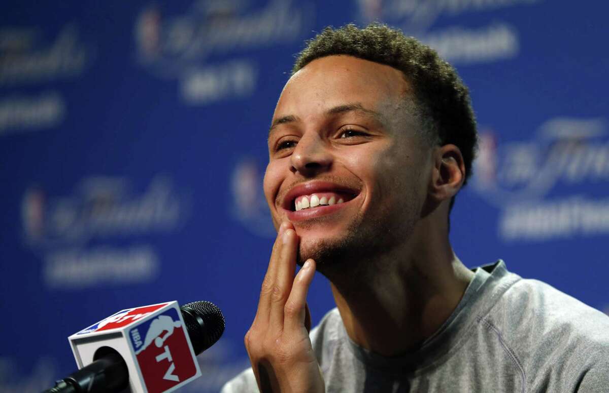 Golden State Warriors guard Stephen Curry answers a question during press conference Wednesday in Cleveland.
