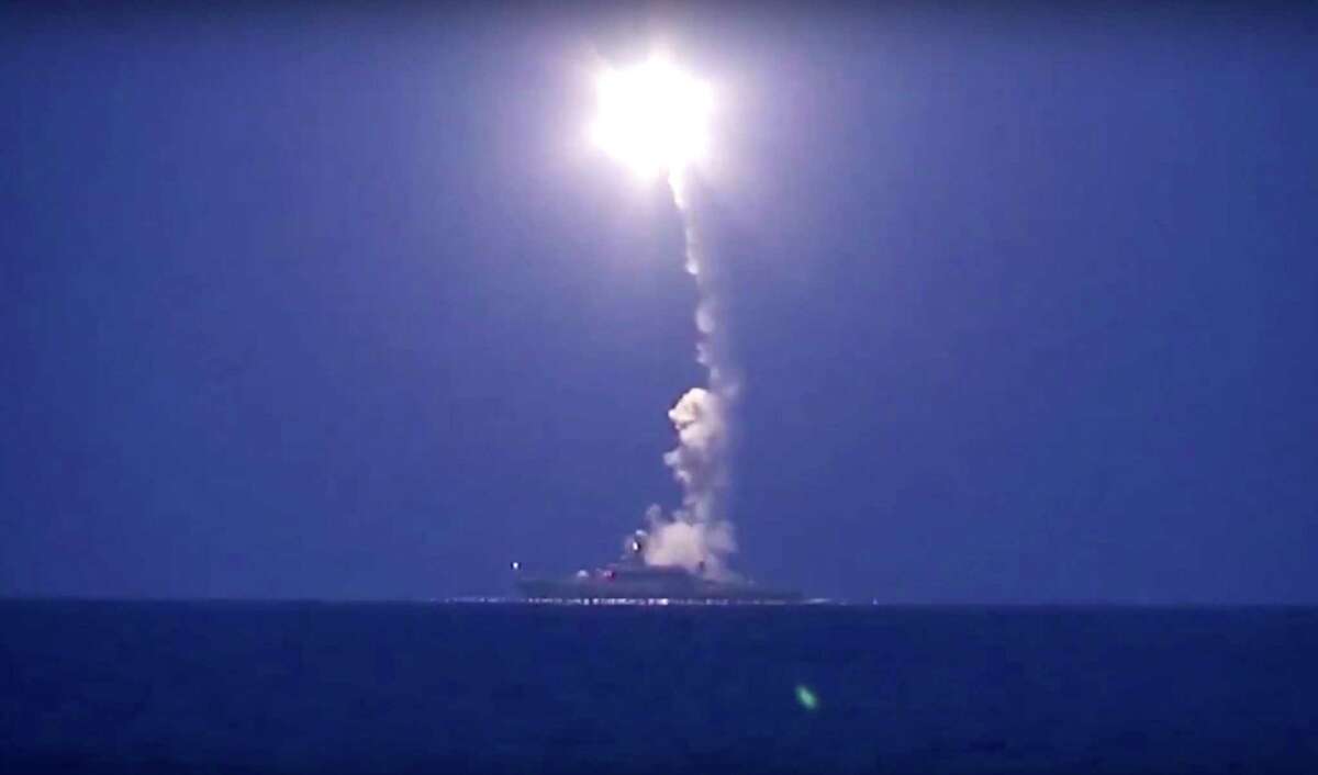 In this photo made from the footage taken from Russian Defense Ministry official web site, Wednesday, Oct. 7, 2015, a Russian navy ship launches a cruise missile in the Caspian Sea. Russia’s Defense Minister Sergei Shoigu said four Russian navy ships in the Caspian launched 26 cruise missiles at Islamic State targets in Syria.