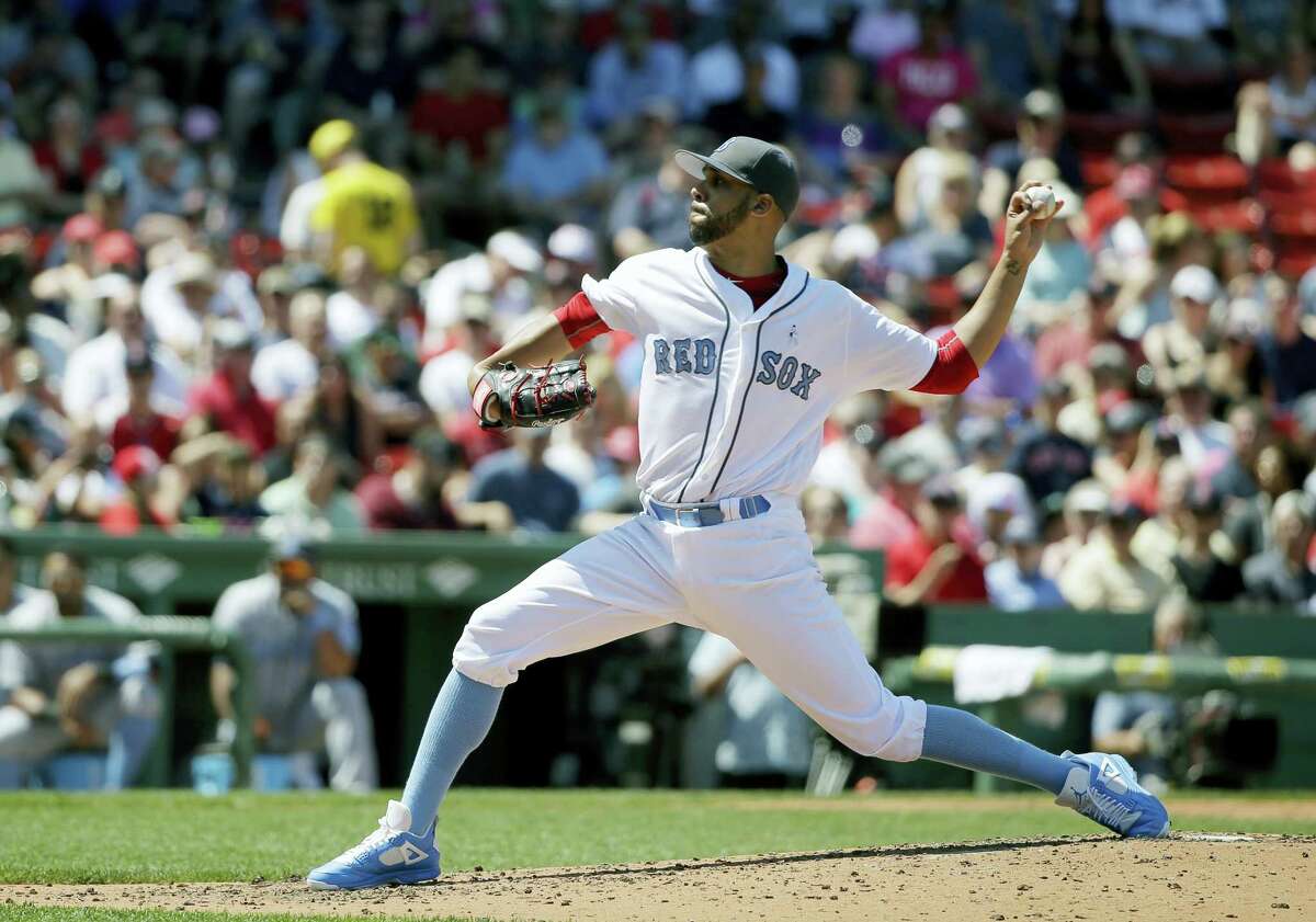 David Price delivers a pitch against the Mariners Sunday in Boston.
