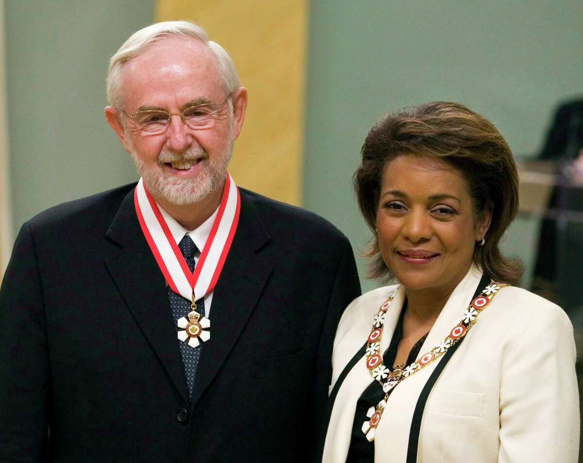 In this April 11, 2008 photo, scientist Arthur McDonald, left, of Kingston, Ontario is invested as Officer to the Order of Canada by Governor General Michaelle Jean during a ceremony at Rideau Hall in Ottawa, Ontario.