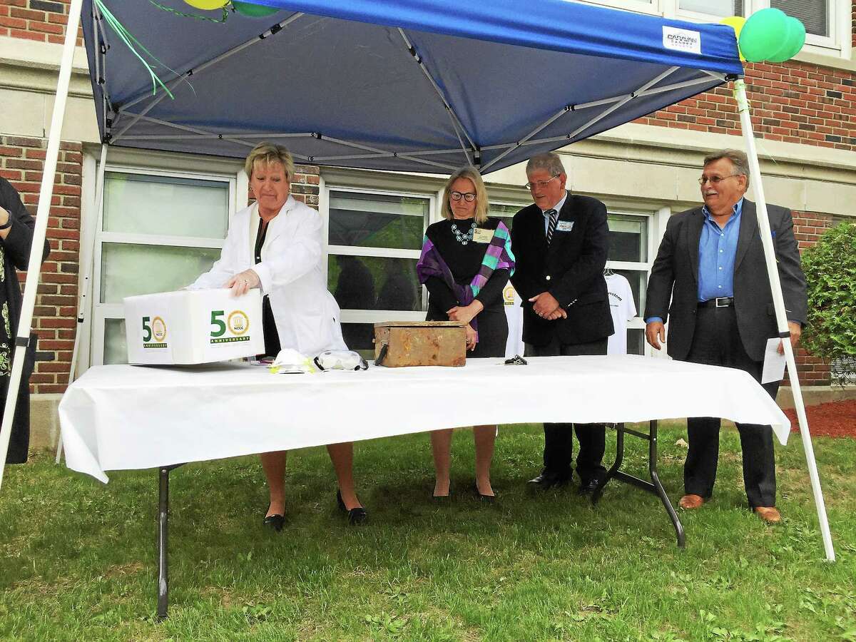 A time capsule buried in 1990 is opened as part of an open house commemorating NCCC’s 50th anniversary.