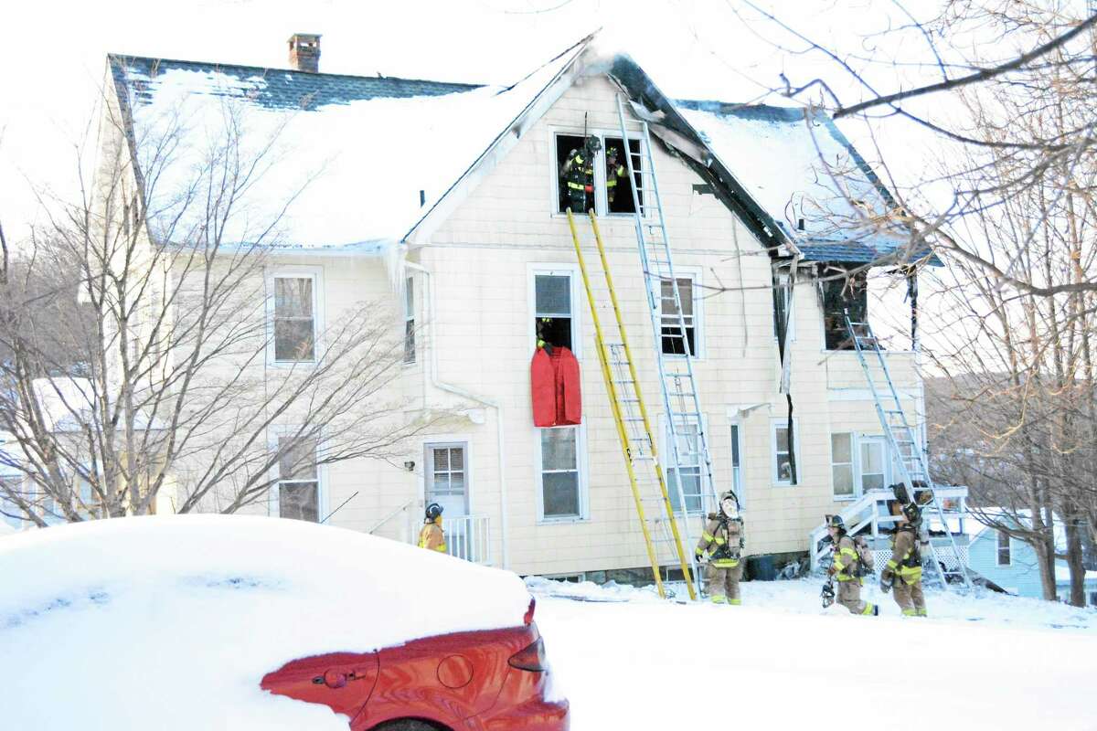 Firefighters responded to a three-alarm fire at 62 Rockwell St. on Friday afternoon.