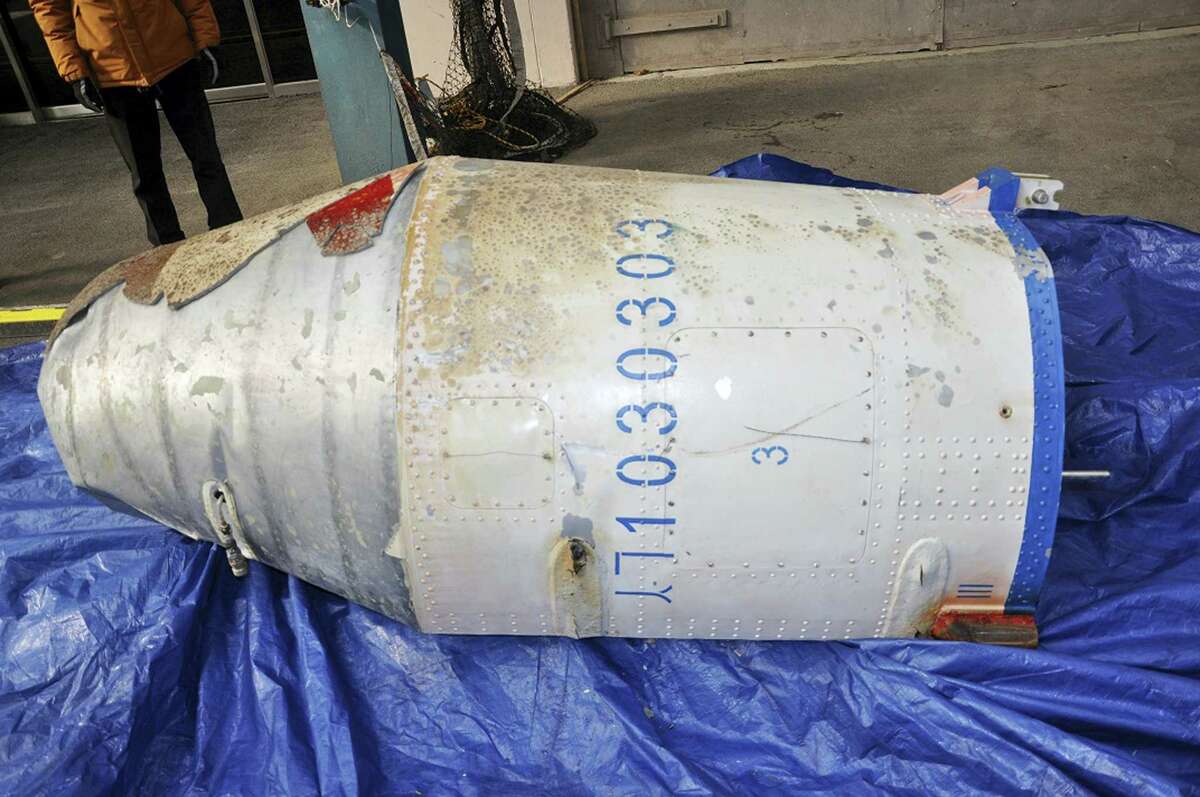 In this photo provided by the South Korean Defense Ministry, an object that the South Korean Defense Ministry believes to be a part of a North Korean rocket is displayed on a South Korean navy ship Tuesday, Feb. 9, 2016, in undisclosed location, South Korea. North Korea on Sunday, Feb, 7, 2016, defied international warnings and launched a long-range rocket that the United Nations and others call a cover for a banned test of technology for a missile that could strike the U.S. mainland. North Korea has also expanded a uranium enrichment facility and restarted a plutonium reactor that could begin recovering material for nuclear weapons in weeks or months,