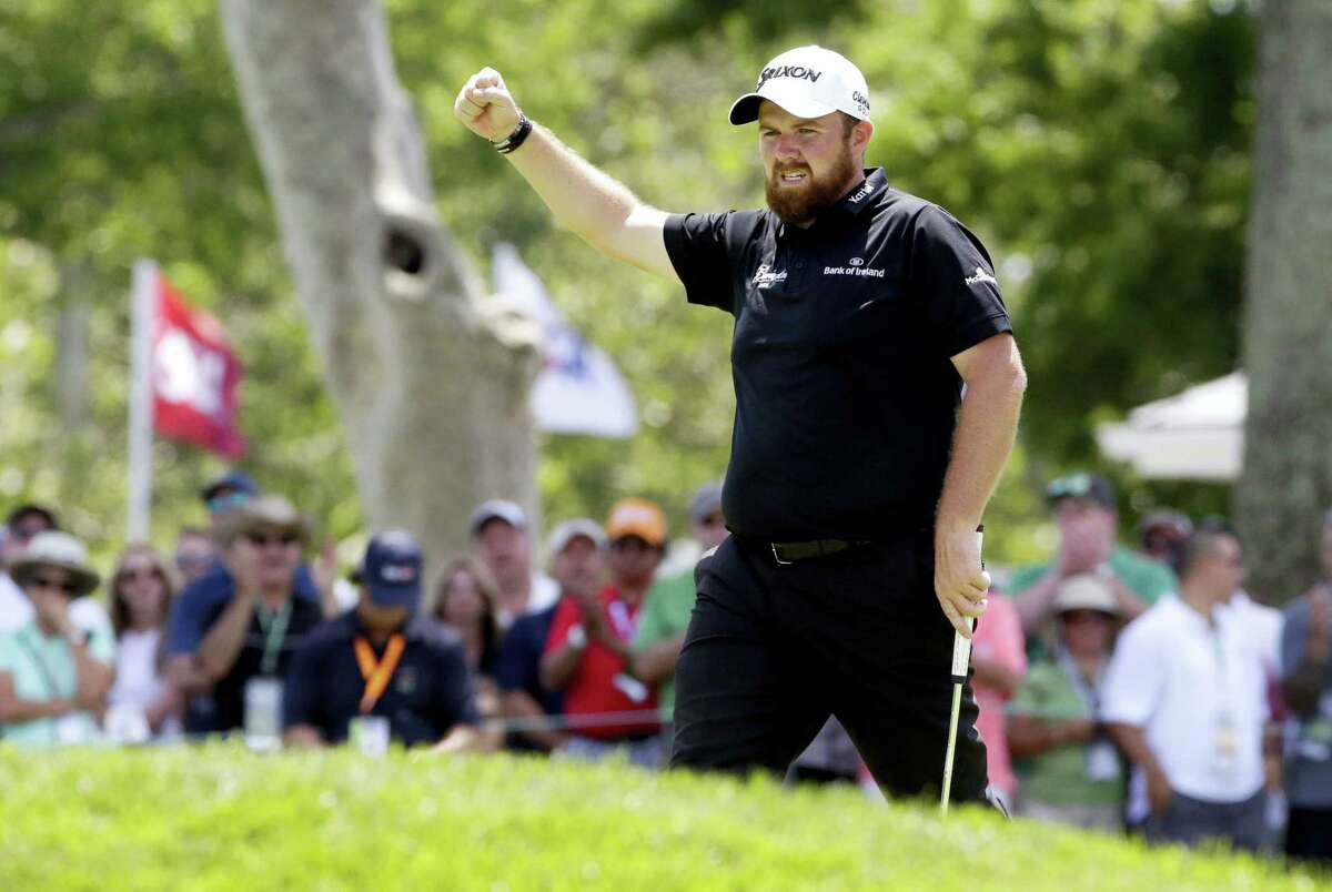 Shane Lowry reacts after making a birdie on the ninth hole on Saturday.