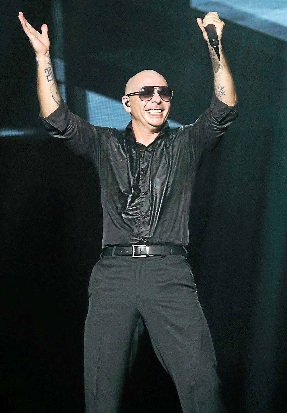 Photo by John Atashian Armando Perez, better known by his stage name Pitbull, is shown entertaining a sold out crowd of his fans at the Foxwoods Resort & Casino on Saturday night May 23. Pitbull is y on tour in support of his eighth studio album,ìGlobalization.î To learn more about the upcoming concerts coming to Foxwoods, visit www.foxwoods.com