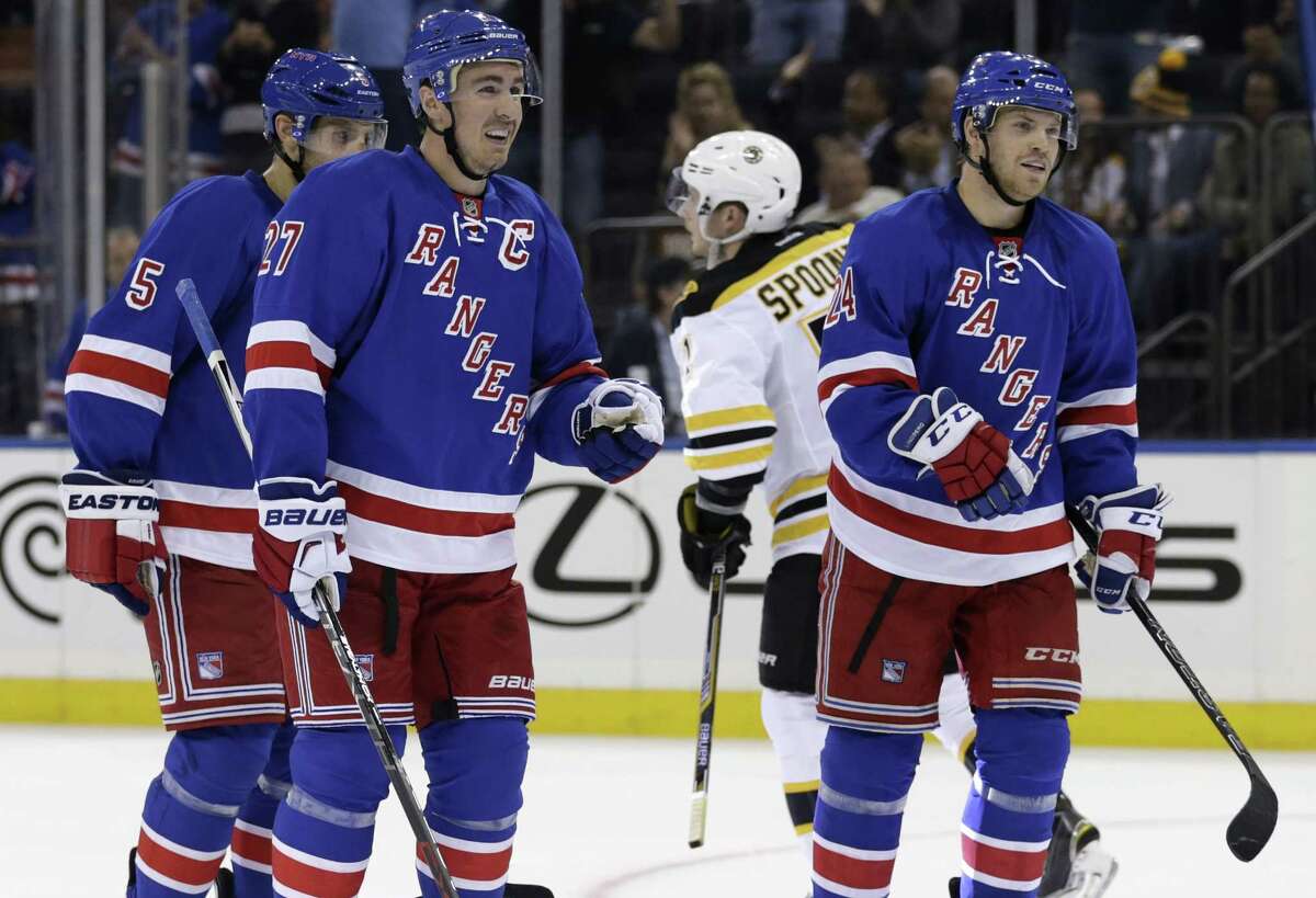 New York Rangers defenseman Ryan McDonagh (27) celebrates after scoring a goal against the Boston Bruins during the second period of an NHL preseason hockey game at Madison Square Garden in New York, Wednesday, Sept. 30, 2015. (AP Photo/Adam Hunger)