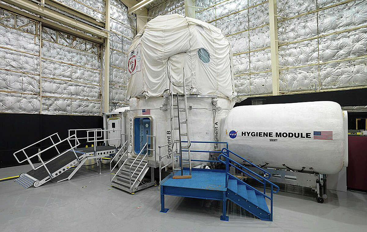 This Nov. 15, 2013 photo released by NASA shows the three-story Human Exploration Research Analog habitat at the Johnson Space Center in Houston. The space agency, which is contemplating a future journey to Mars, is working with a military laboratory at the submarine base in Groton, Conn., to measure how teams handle stress during month-long simulations of space flight.