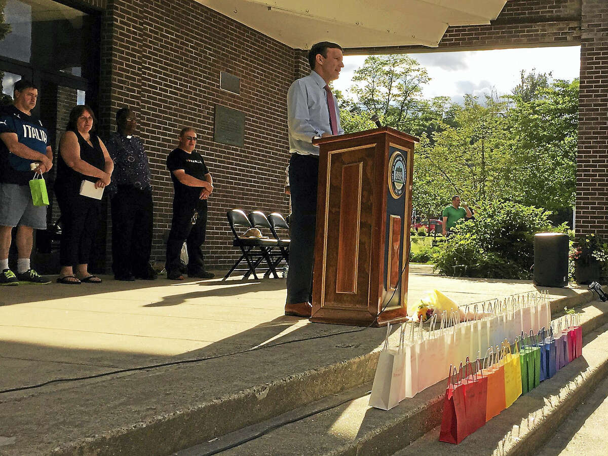 Ben Lambert - The Register CitizenA vigil was held in remembrance of the victims of the recent mass shooting in Orlando, including city native Kimberly Morris, Friday in Torrington.