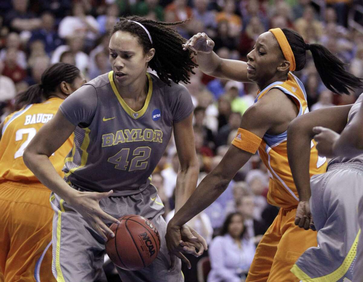 In this March 2012 file photo, Baylor’s Brittney Griner grabs a rebound in front of Tennessee’s Glory Johnson.