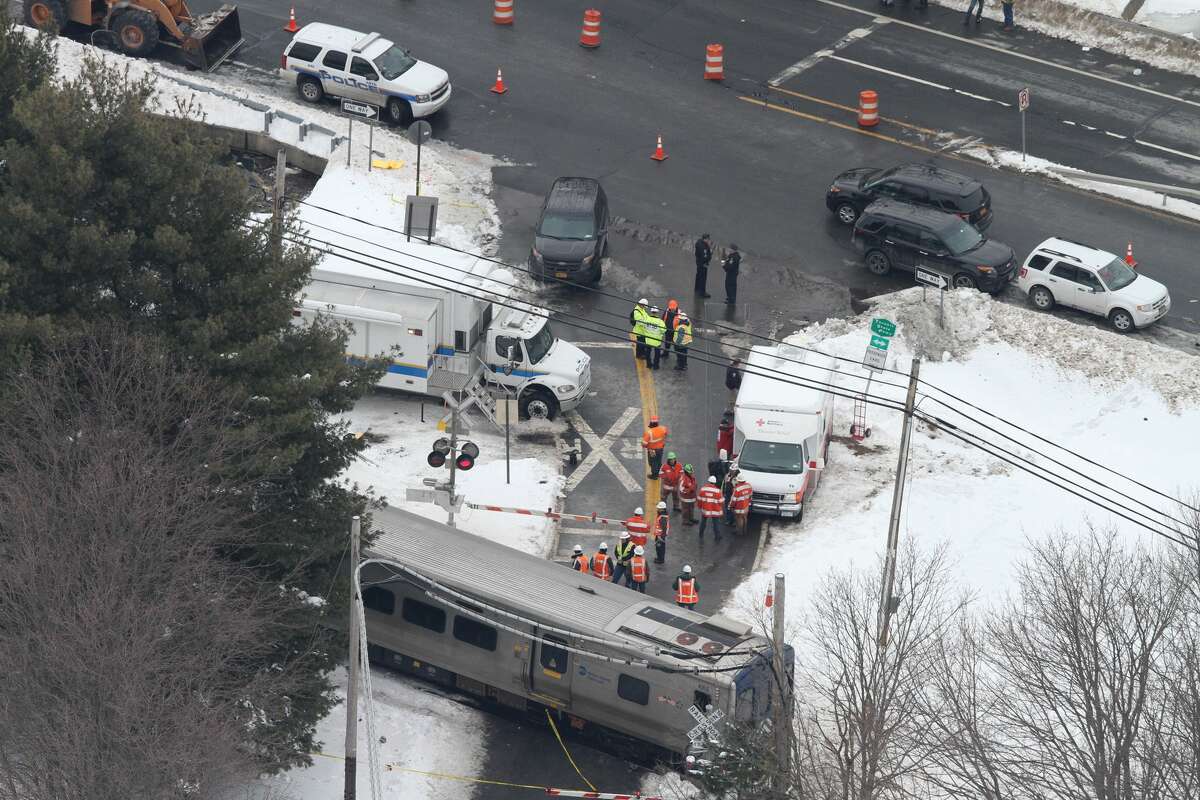 Personnel from various agencies work the scene of a deadly commuter train accident in Valhalla, N.Y., Wednesday, Feb. 4, 2015. (Frank Becerra Jr. — The Journal-News)
